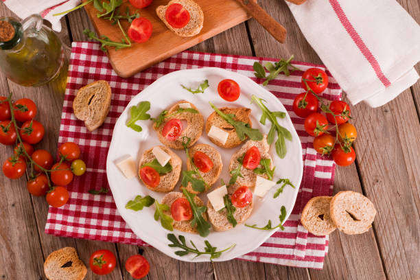 istock Friselle with cherry tomatoes and arugula. 1460471742