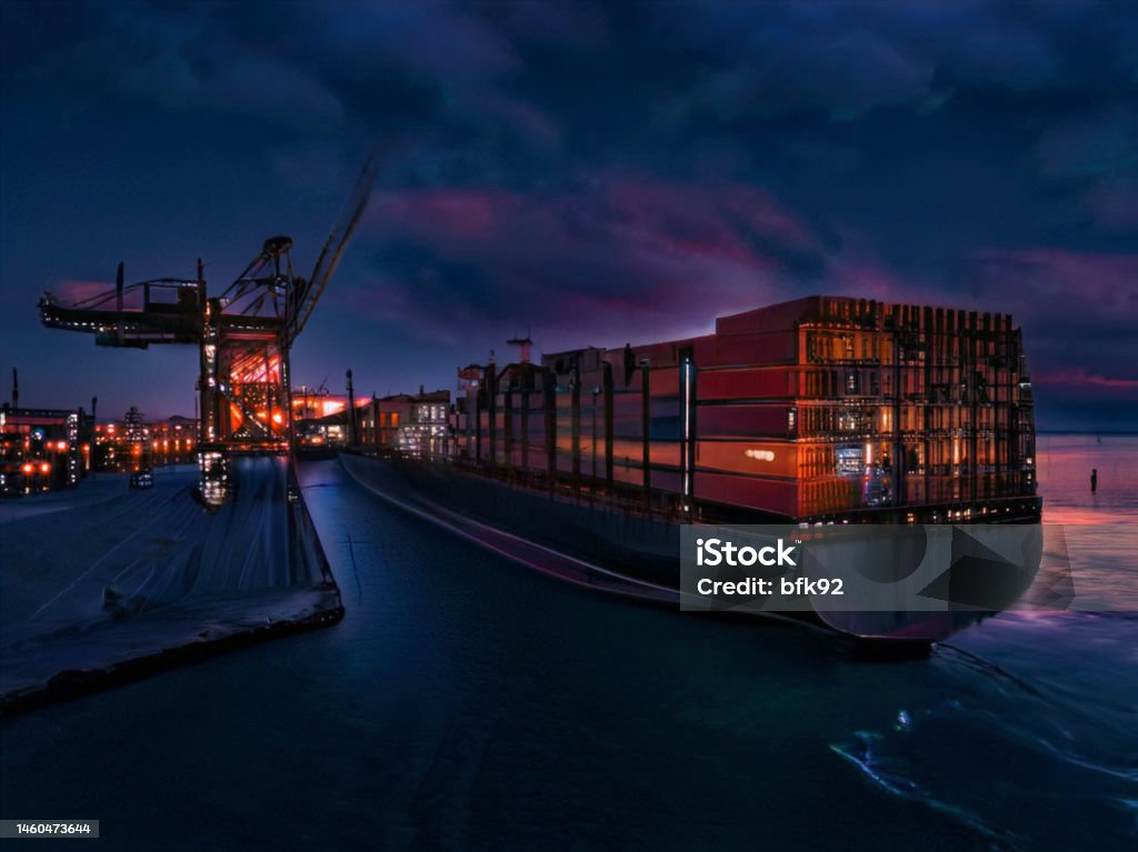 Aerial view of cargo ship in transit at night. Cargo Container Stock Photo