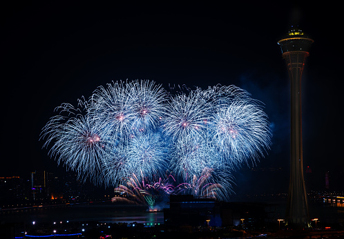 Colorful fireworks rose from Nam Van Lake and bloomed beside the Macau Tower.