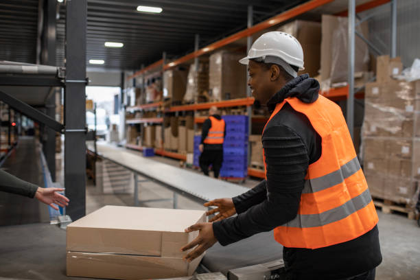 istock A black male warehouse worker on a packing and delivery production line 1460478928