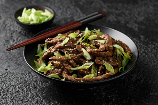 Korean beef Bulgogi BBQ with sesame seeds and spring onion.