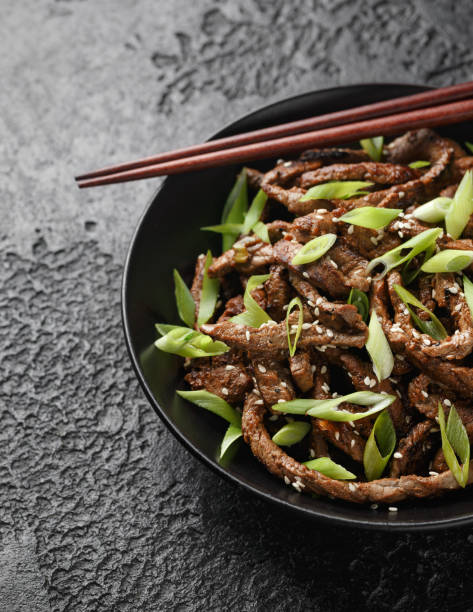 istock Korean beef Bulgogi BBQ with sesame seeds and spring onion. 1460479047