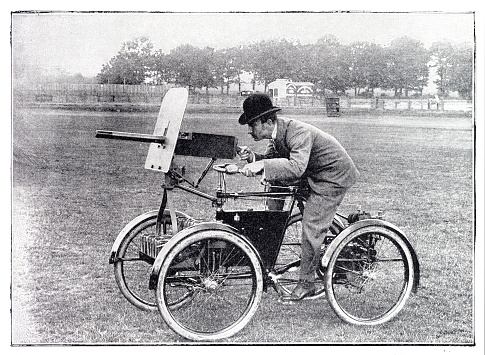 The Motor Scout was the first armed petrol engine powered vehicle ever built. It was not intended for running over ploughed fields or charging, but it was designed to provide a cover or to support infantry and cavalry wherever good roads were available.
It was designed and built by British inventor F. R. Simms in 1898. He mounted a standard mark IV Maxim machine gun above the front wheels of a quadricycle. The Maxim gun, with its readily accessed 1,000 rounds of ammunition, took the place of a second rider.
Original edition from my own archives
Source : Ilustración Artística 1899