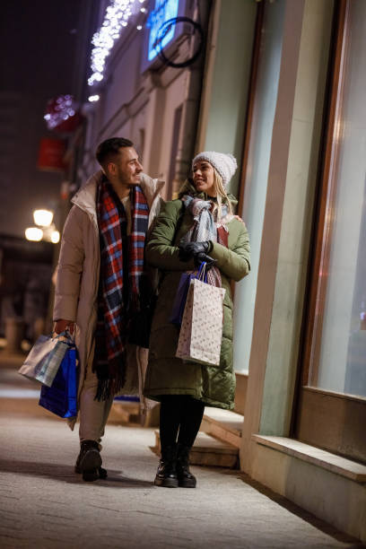 istock Heterosexual couple window shopping during Christmas holidays 1460490941