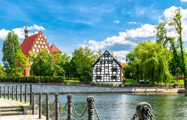 Ancient medieval buildings of watermills and granaries in Bydgoszcz on the Brda river, Poland