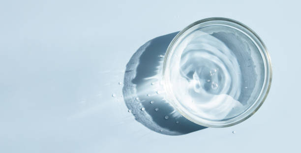 istock petri dish with liquid water on plain on a light background water ripple texture 1460492969