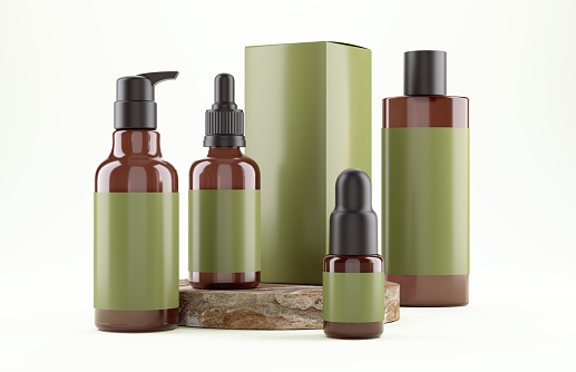 Natural Skin Care Products, organic serum oil bottles  on stone isolated on white background