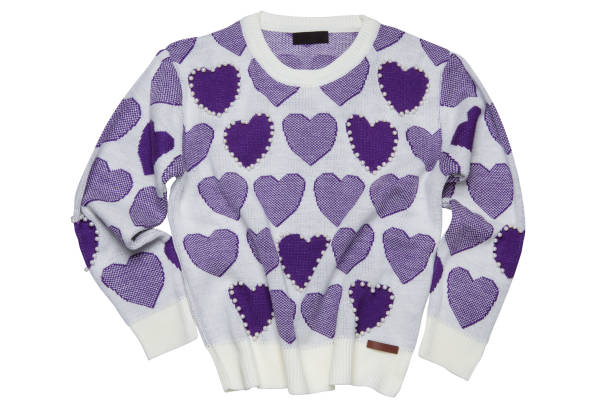 istock White knitted sweater with lilac hearts and pearls, on a white background 1460493730
