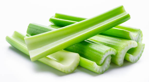 istock Pile of celery ribs isolated on white background. 1460493756