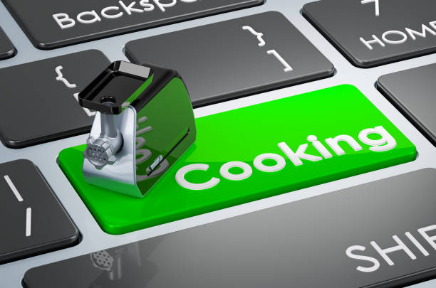 istock Cooking key, meat grinder on keyboard. 3D rendering 1460501282