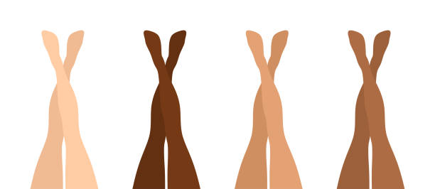 Beautiful raised crossed female legs of different skin color isolated on white background. Flat vector illustration Beautiful raised crossed female legs of different skin color isolated on white background. Flat vector illustration feet up stock illustrations