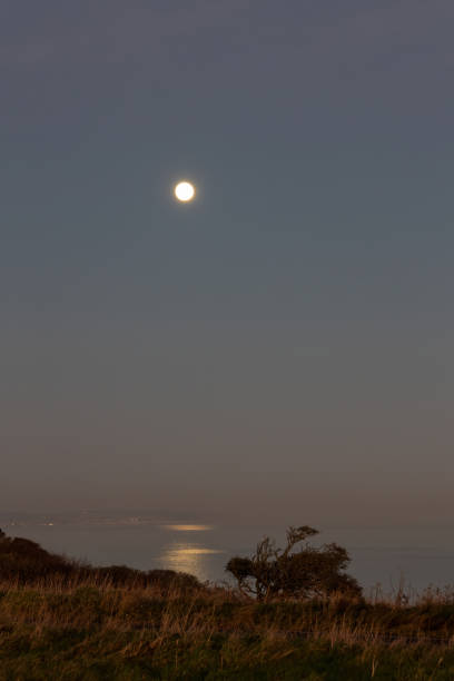 istock Full Moon Over Sea Near Eastbourne 1460504058
