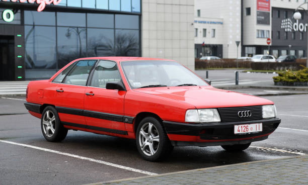 Belarus, Minsk - 24.01.2023:Red Audi 100 car parked in the city.