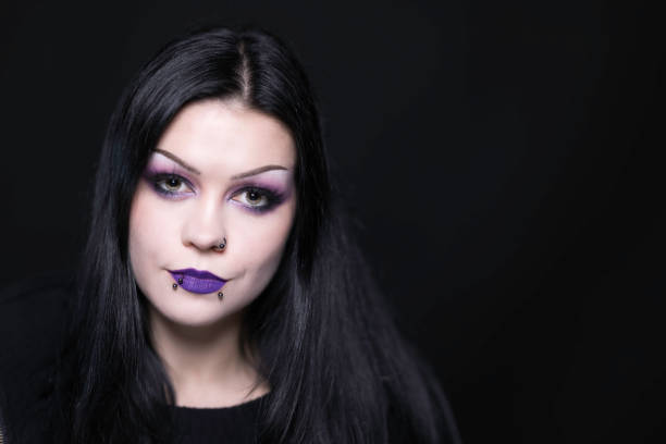 Goth lady of 30 photographed in a studio.