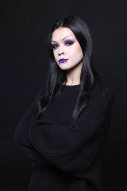 Goth lady of 30 photographed in a studio.