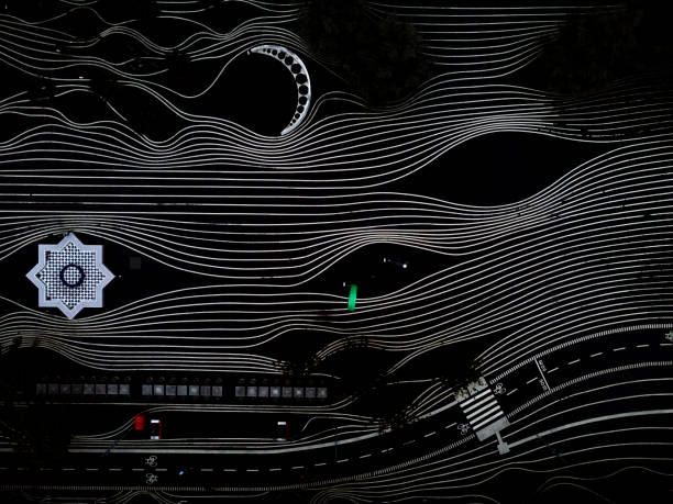 Drone images of  Superkilen in the Nørrebro district of Copenhagen. Commuters ride their bicycles on the bike lanes and pedestrians walk across the intriguing black and white patterns or red colours of the park. This popular park is situated in the epicenter of one of Denmarks most ethnical-diverse and socially challenged areas , and is designed as a meeting place to bring together locals. Besides sporting a family friendly playground and a hangout for chess players, athletes etc., it is a well visited tourist attraction.