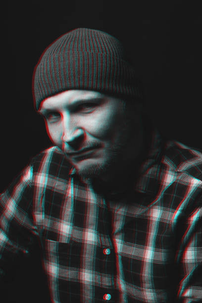 istock Man with winter hat and checkered shirt studio portrait in glitch and RGB color split effect style 1460516251