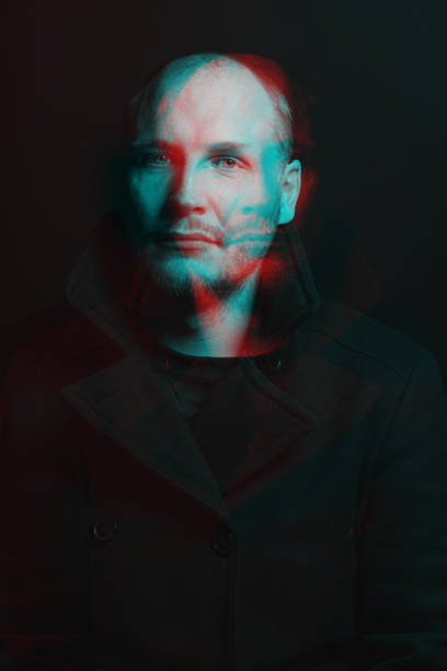 istock Serious man with black winter coat studio portrait in glitch and RGB color split effect style 1460516276