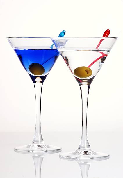 istock Two martini glasses with olives 146052363