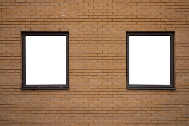 istock Two blank windows with wooden frames on orange brick wall background 1460526095