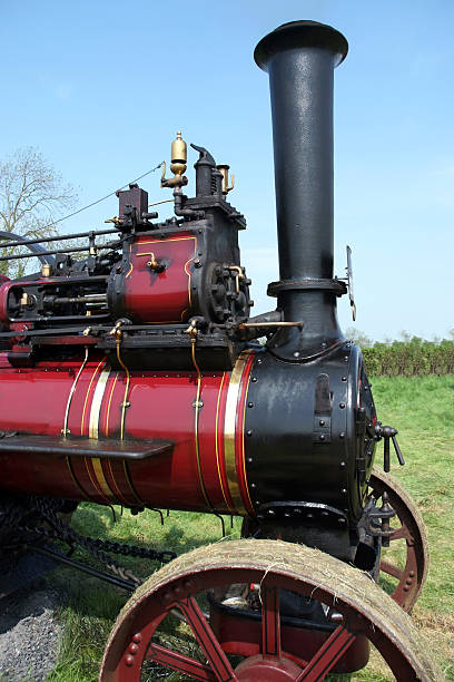 Power An old steam traction engine first used for agriculture around 1850 firebox steam engine part stock pictures, royalty-free photos & images