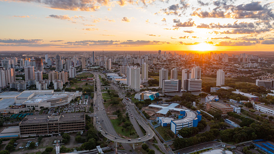 Aerial footage of Cuiabá, capital of the state of Mato Grosso, aerial view of the city center. Dusk on Avenida do CPA, historian Rubens de Mendonça. images recorded in January 2023. It demonstrates the urban area, buildings and streets of the City. Administrative Political Center