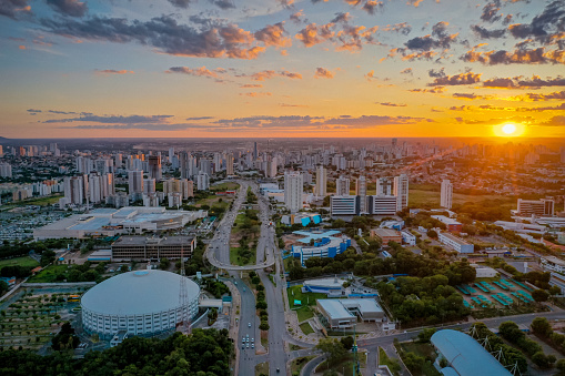 Aerial footage of Cuiabá, capital of the state of Mato Grosso, aerial view of the city center. Dusk on Avenida do CPA, historian Rubens de Mendonça. images recorded in January 2023. It demonstrates the urban area, buildings and streets of the City. Administrative Political Center