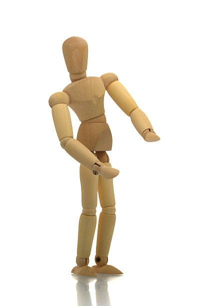 istock Posing wooden manikin 146053783