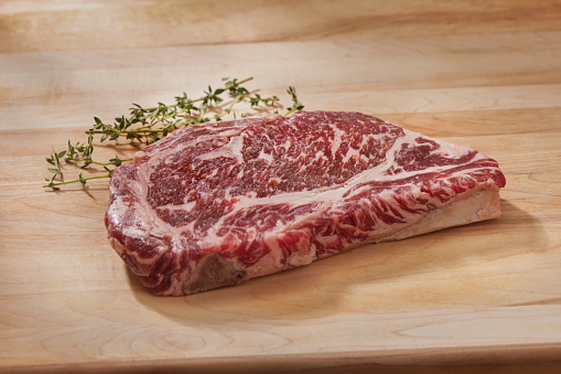 Raw, Dry Aged Rib Eye Beef Steak