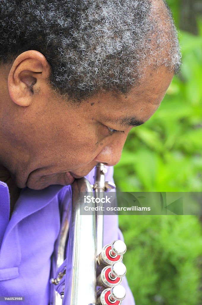 Jazz musician reflecting. Jazz musician reflecting on his recent performance. African Ethnicity Stock Photo