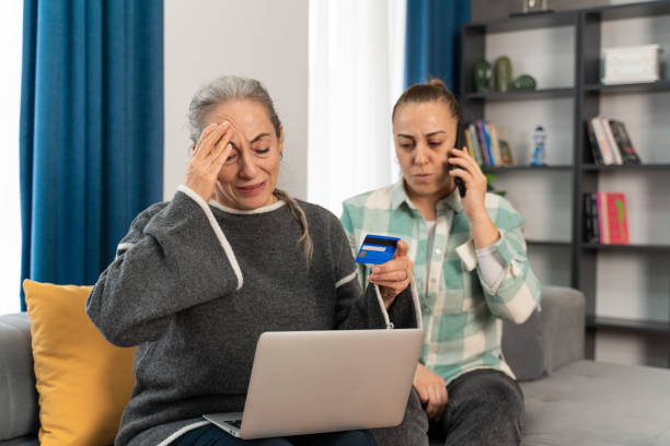 istock Senior woman realizes she was scammed while shopping online 1460542983
