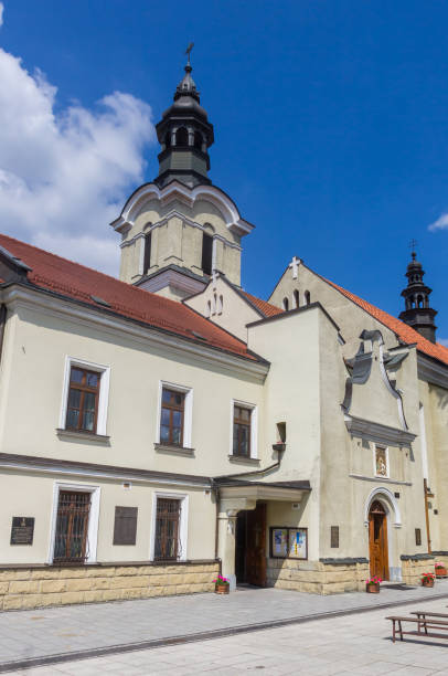 tower of the historic jesuit monastery in nowy sacz - nowy sacz imagens e fotografias de stock