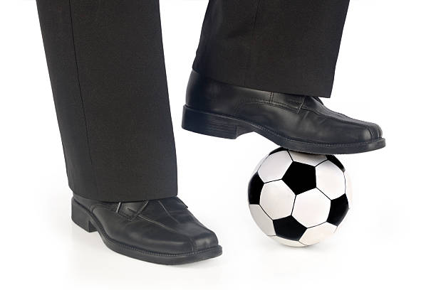 istock Soccer ball and shoes 146054377