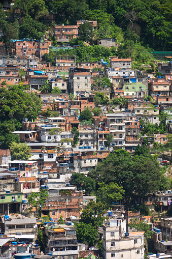 Beautiful view to poor favela houses on hill side in Rio de Janeiro, State of Rio de Janeiro, Brazil