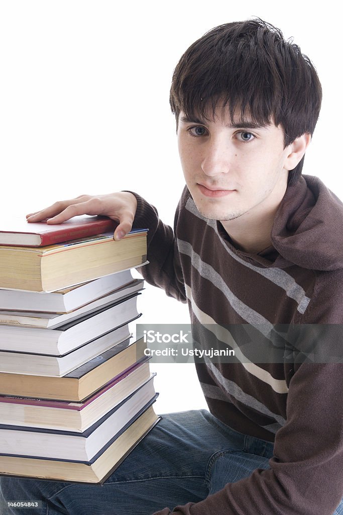 Jeunes étudiants avec les livres isolé sur un blanc - Photo de Adolescent libre de droits