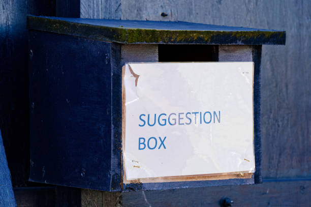 istock Suggestion box and sign at construction site entrance 1460548870