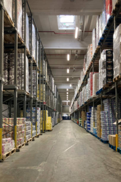 istock warehouse with racks filled with goods 1460549863