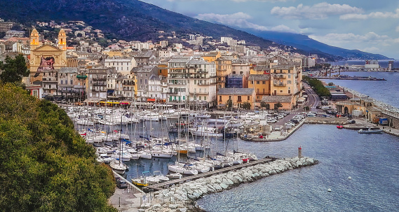 Luxury pleasure boats and yachts in Bastia port on sunny summer day, Corsica island, France