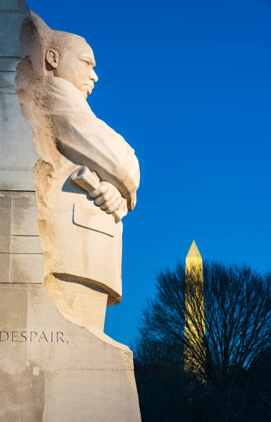 Martin Luther King Jr. Memorial in Washington, D.C., USA Washington, D.C., USA - January 24, 2023: Martin Luther King Jr. Memorial in Washington, D.C., USA in the evening with the Washington Monument in the background. civil rights act stock pictures, royalty-free photos & images