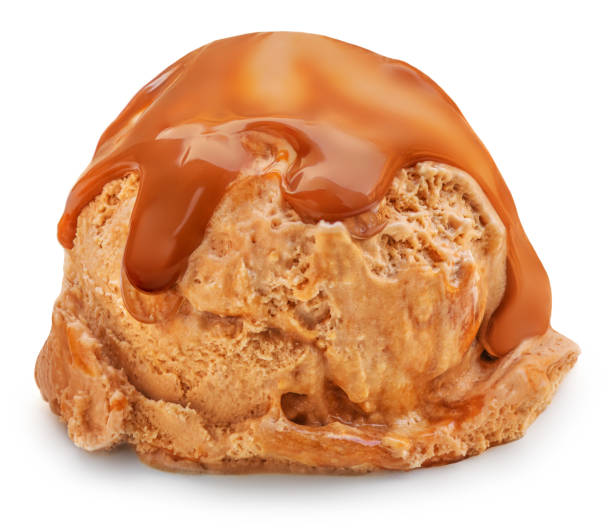 istock Caramel ice cream with melting caramel sauce isolated on white background 1460551211