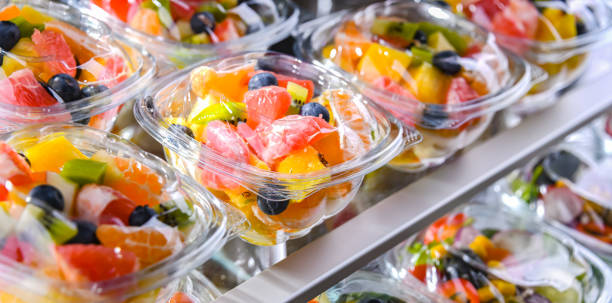 istock Boxes with pre-packaged fruit salads in a commercial fridge 1460552274