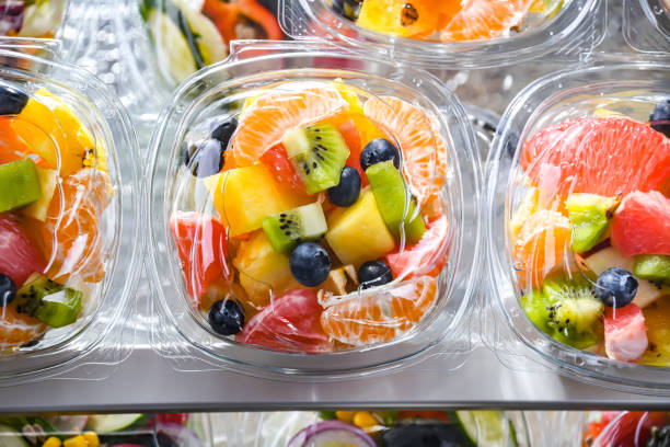 istock Boxes with pre-packaged fruit salads in a commercial fridge 1460552320