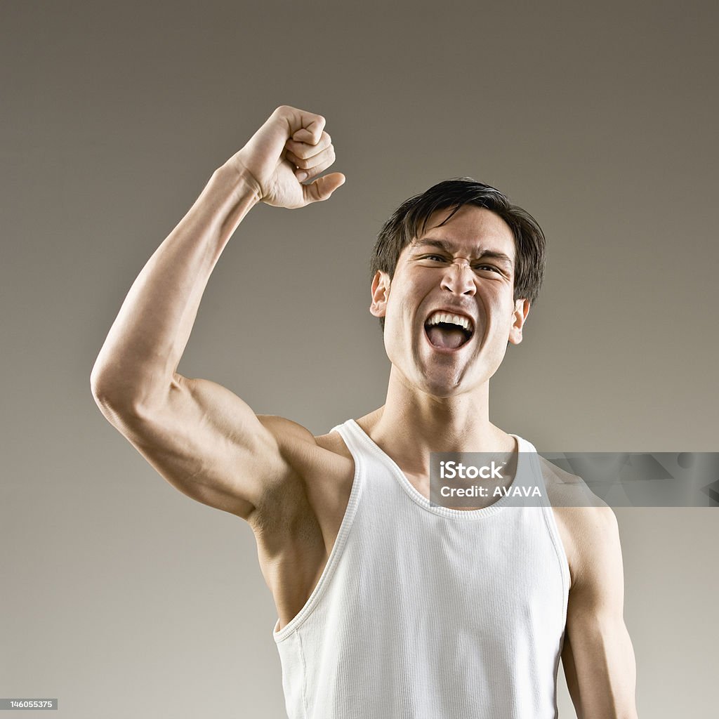 Homem Musculoso a primeira e comemorando - Foto de stock de Animar royalty-free