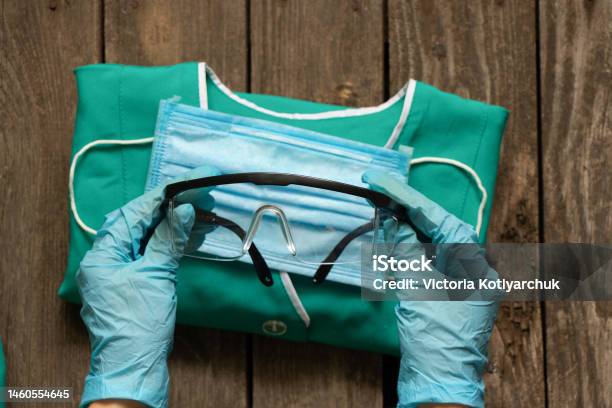 Medical Uniform Set Folded On An Isolated Background Nurse In Ukraine Stock Photo - Download Image Now