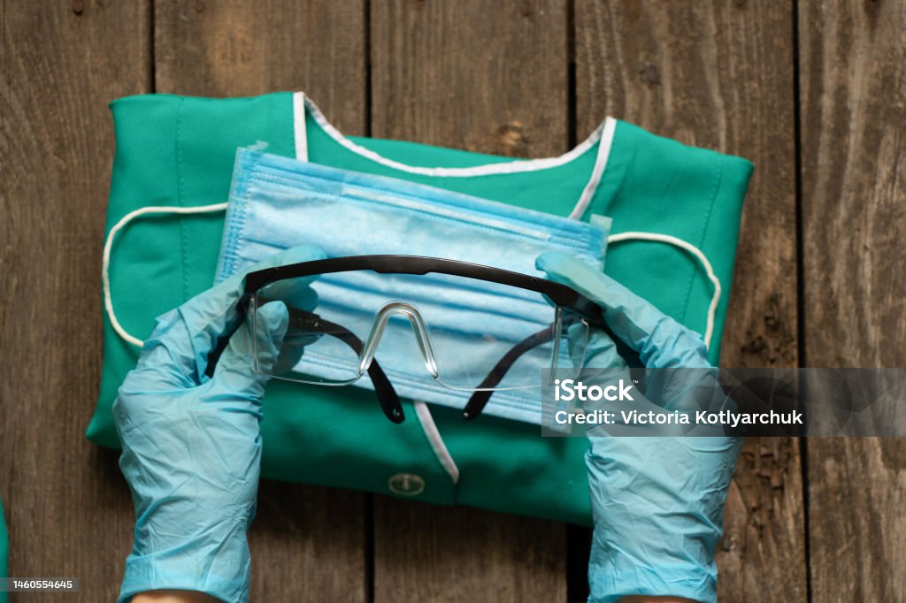 medical uniform set folded on an isolated background nurse in ukraine - Royalty-free Koruyucu İş Giysisi Stok görsel