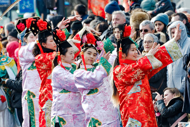 Paris, France, 01/29/2023, Celebration of the Chinese new year in Paris, Young girls parading for the Year of the Tiger.