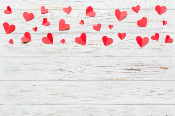 istock Valentine day background with red hearts, top view with copy space 1460556274