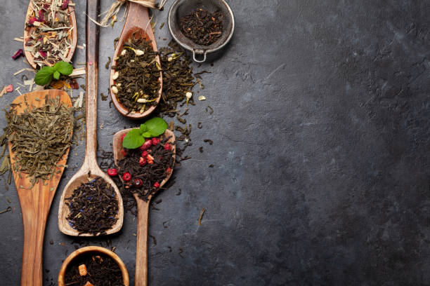 istock Various dried tea in wooden spoons 1460557098