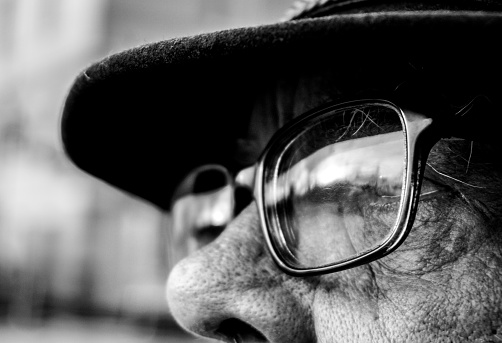 Close up of a man wearing eyeglasses