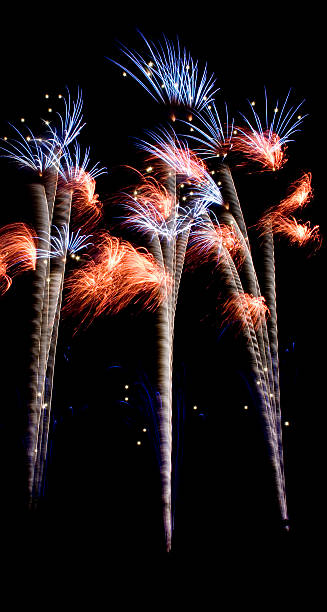 Isesaki fireworks: red blue white tall stock photo